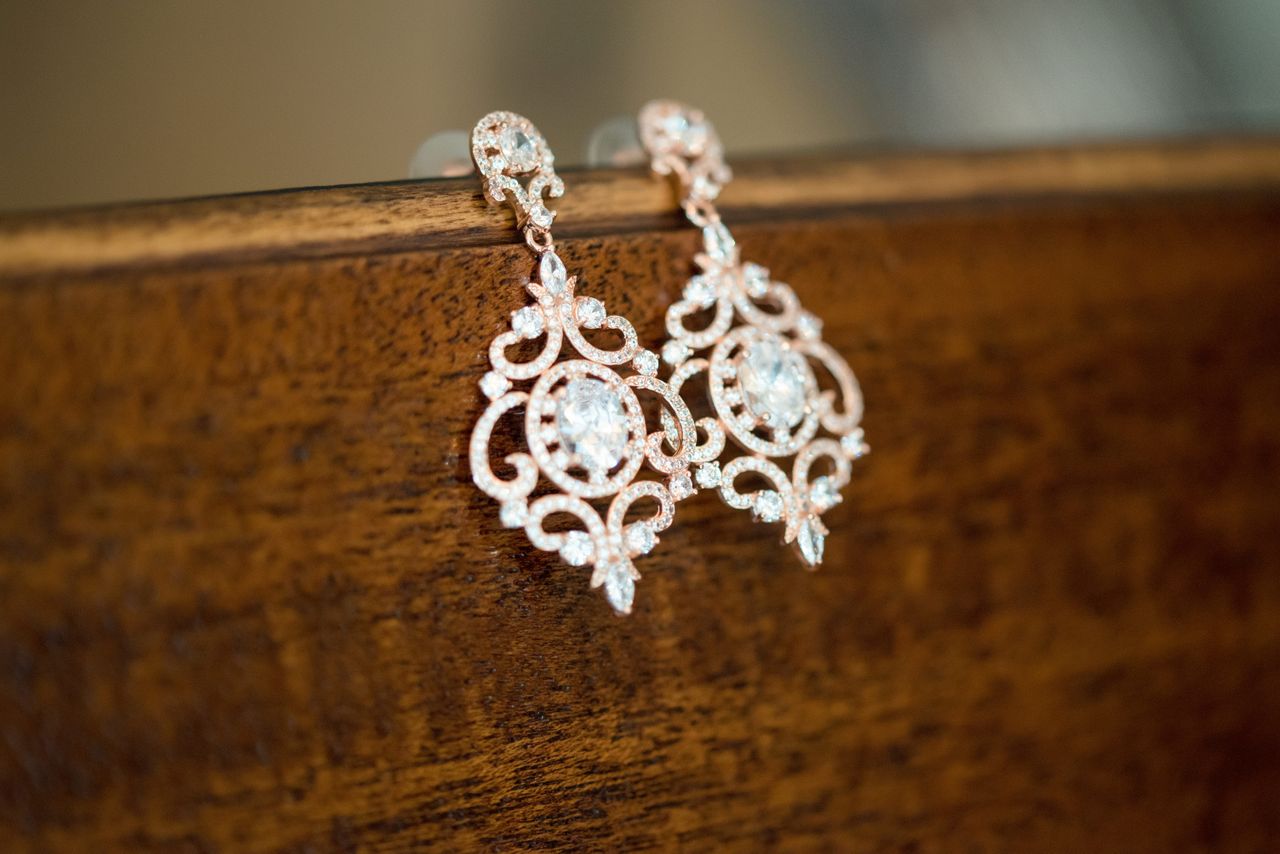 Intricate romantic earrings with diamond gemstone accents